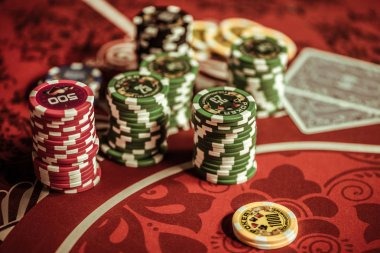 Mobile phone showing live casino interface with payment options